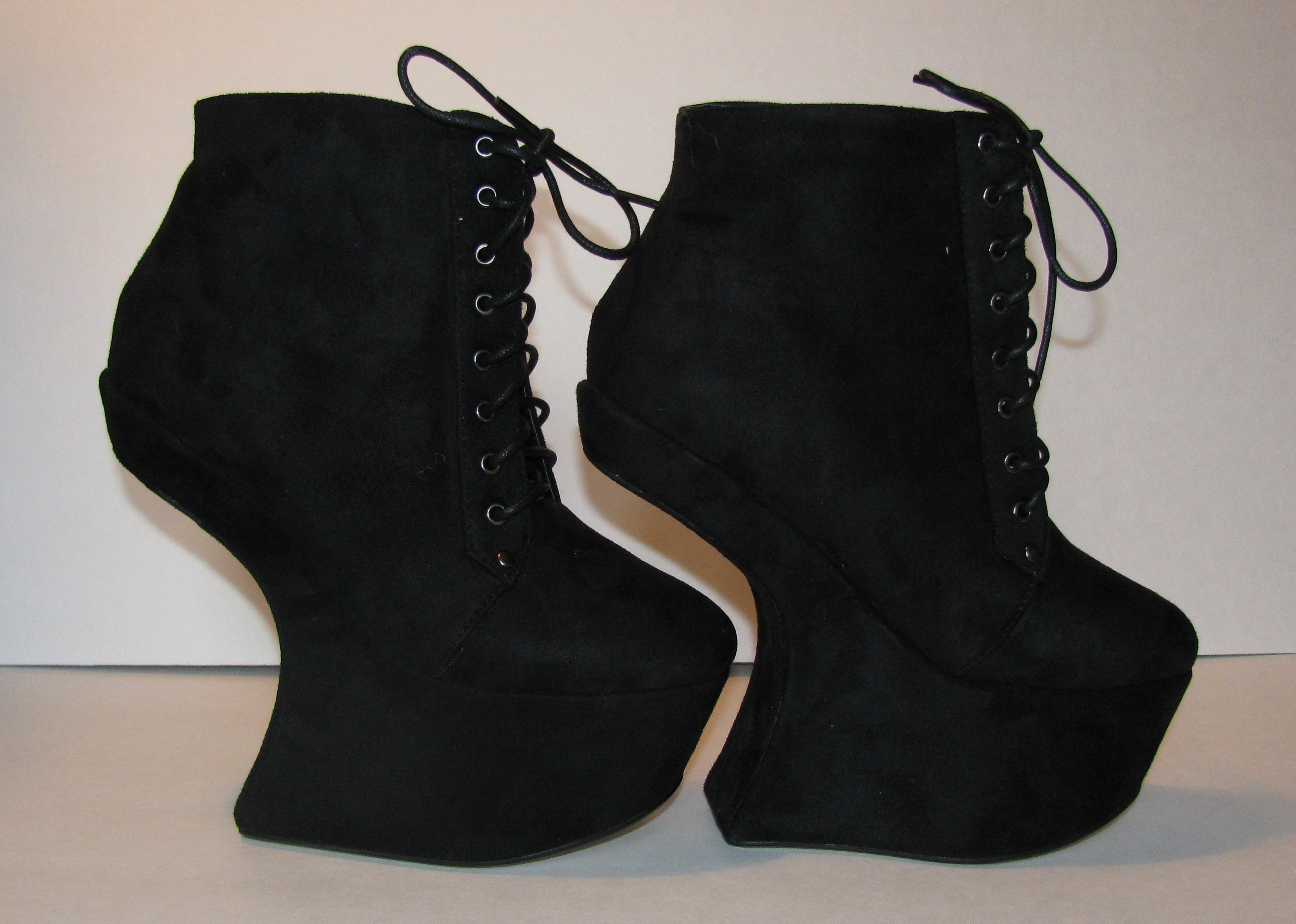 black heel less shoes